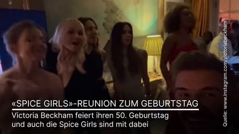 Victoria Beckham celebrates with the Spice Girls