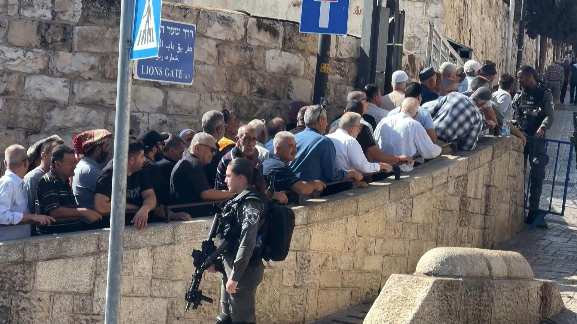Muslims queue for Friday prayers in Jerusalem's Al-Aqsa mosque