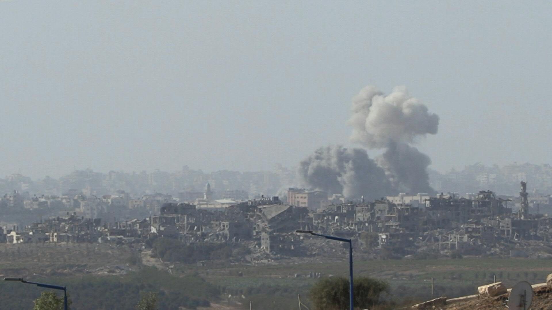 Smoke rises after a blasts in northern Gaza