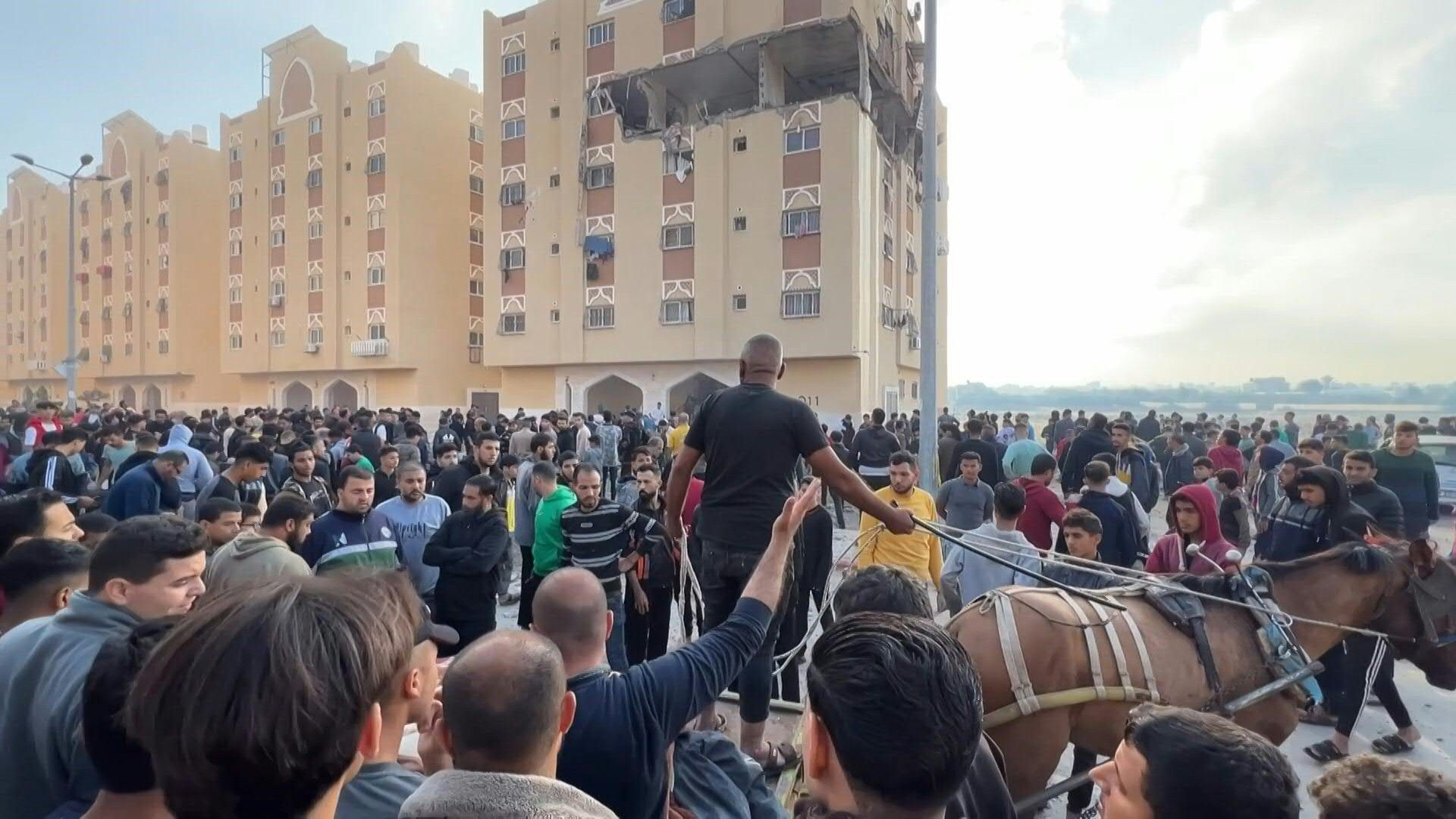 Locals at scene of airstrike near Khan Yunis, southern Gaza