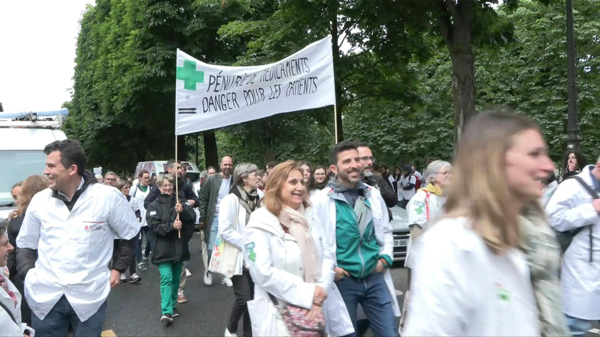 Striking pharmacists demonstrate in Paris over pay and drug shortages