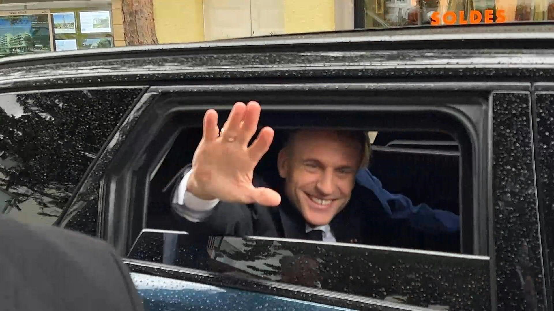 Emmanuel Macron leaves home to vote in second round of elections