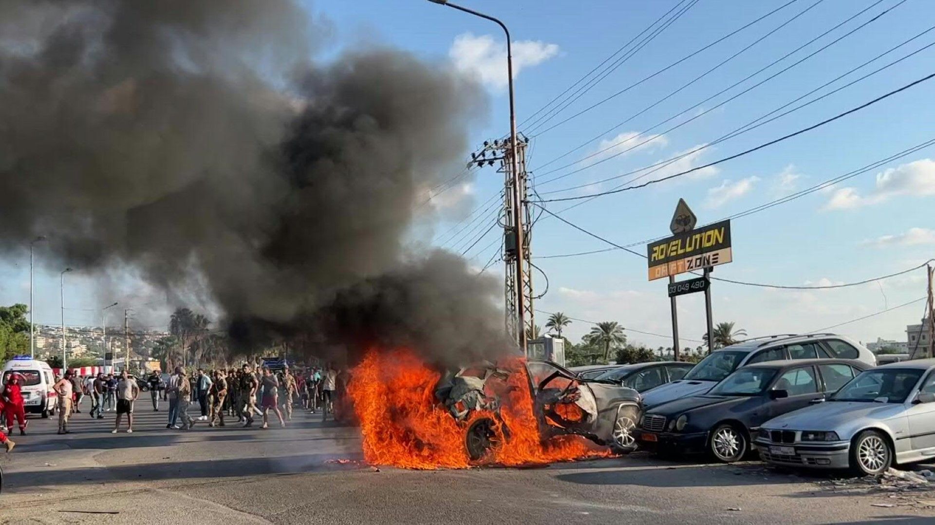 Burning wreckage after Israeli strike kills Hamas official in Lebanon