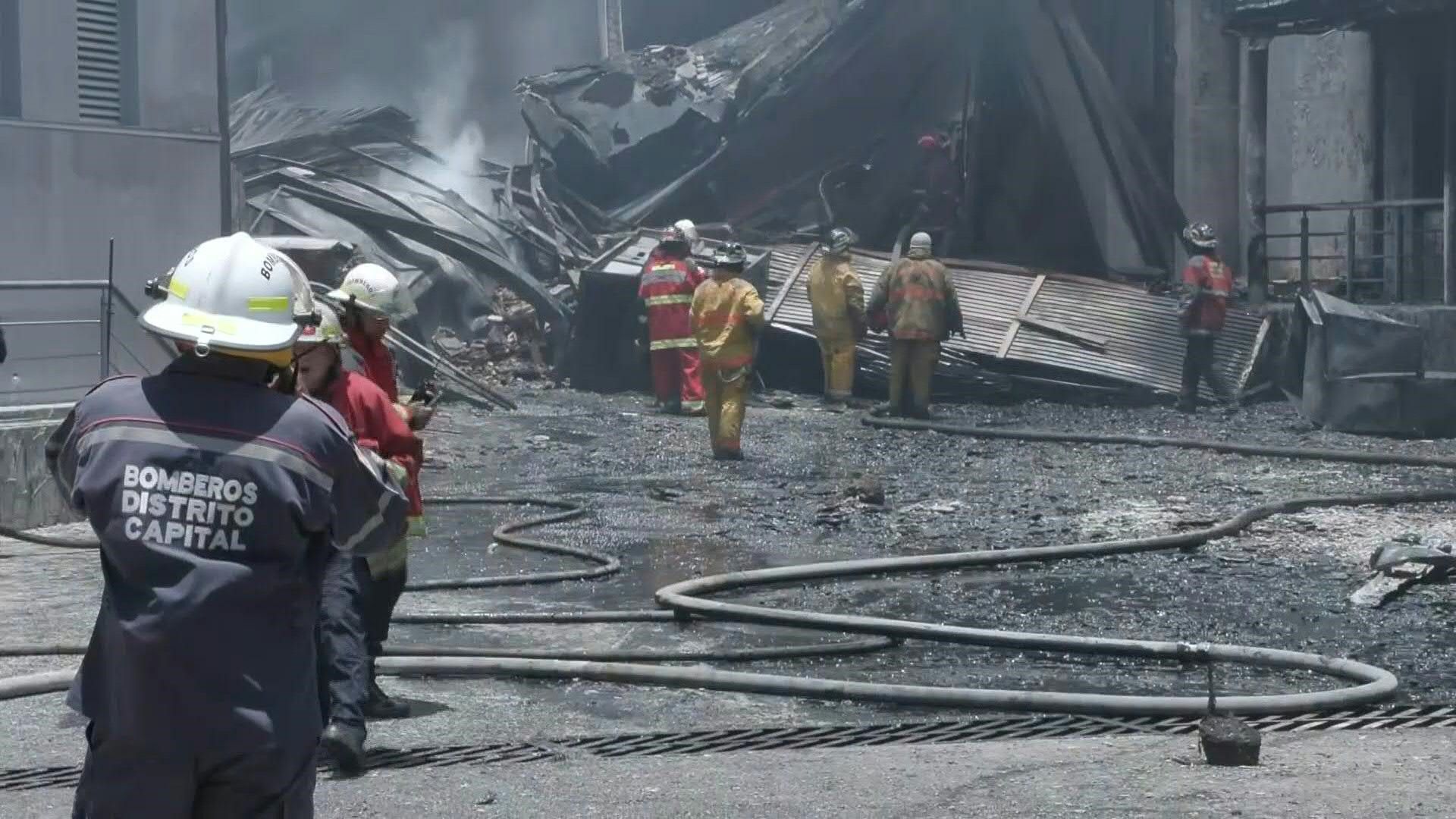 Firefighters battle to extinguish motorbike warehouse blaze in Caracas