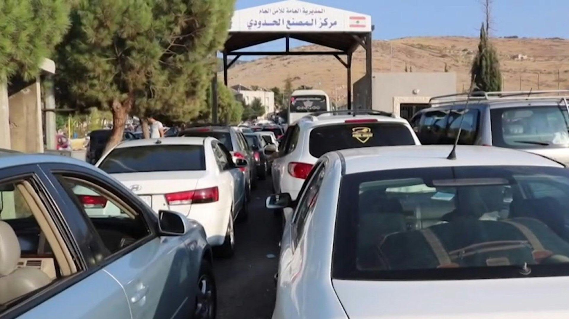 People fleeing Israeli strikes flock to Lebanon-Syria border crossing