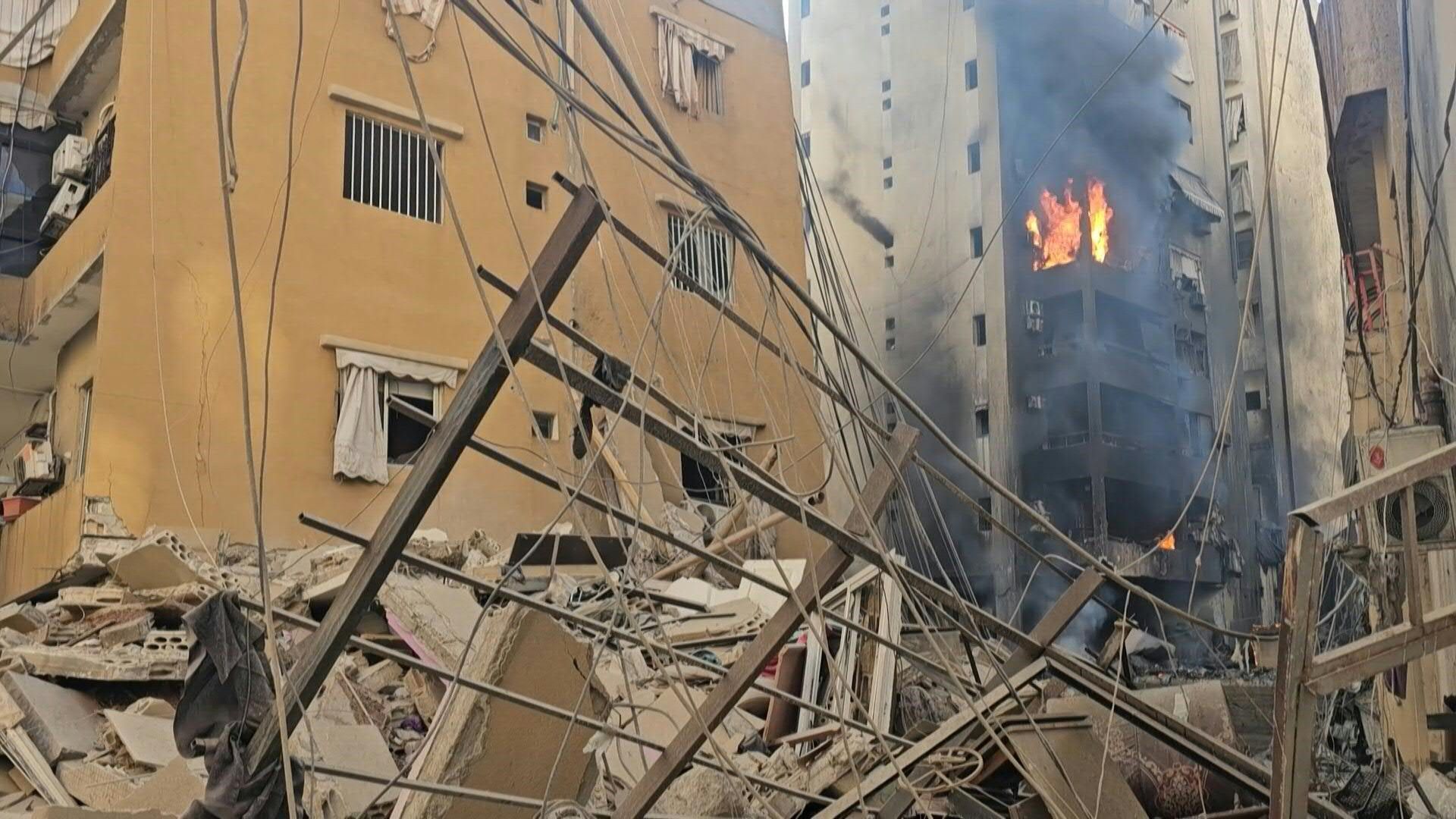 Building ablaze after fresh Israeli strikes on south Beirut