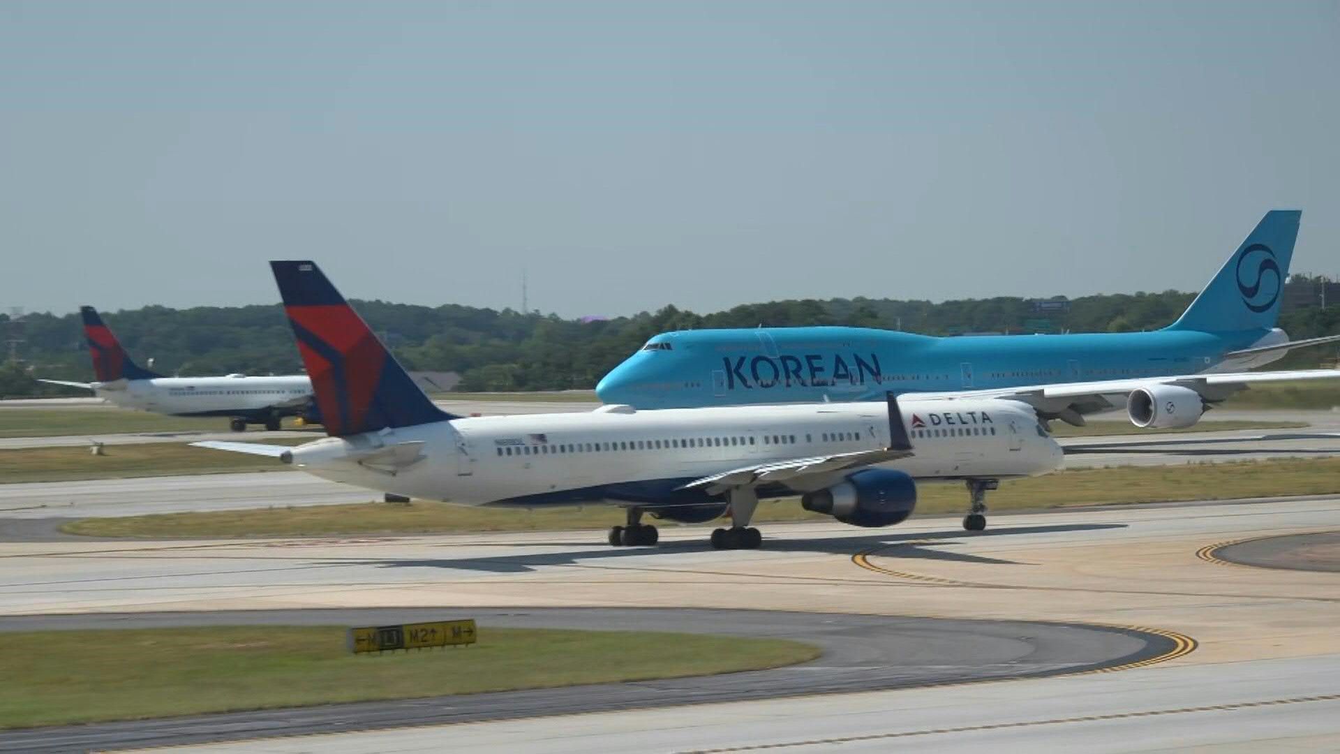 Plane with Korean workers freed after raid takes off from US