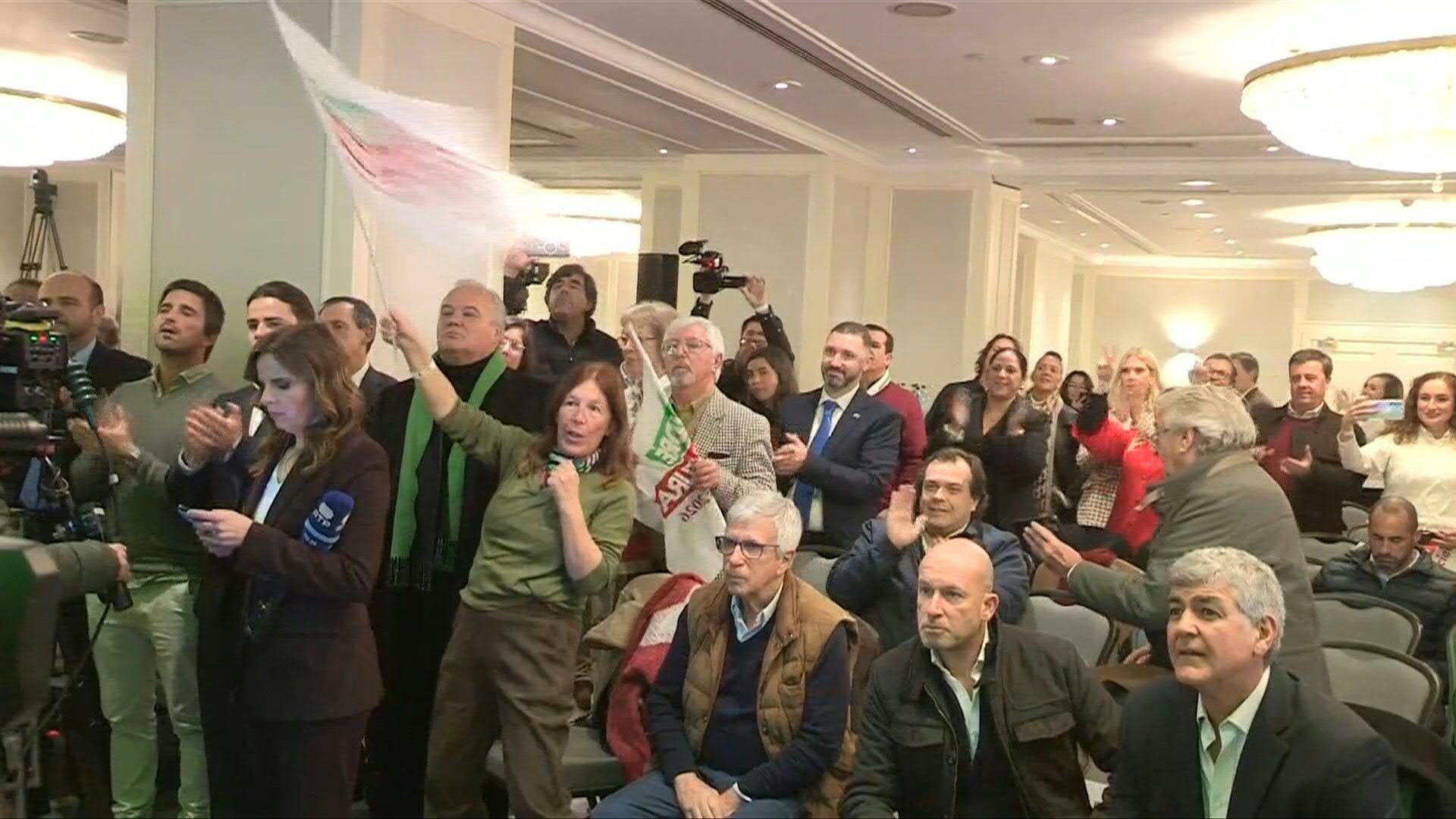 Ventura-supporters-cheer-exit-poll-results-as-far-right-surge-expected-in-Portugal-election