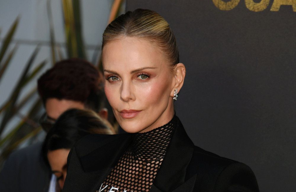 Charlize Theron admits that she has 'real struggles' with raising her daughters