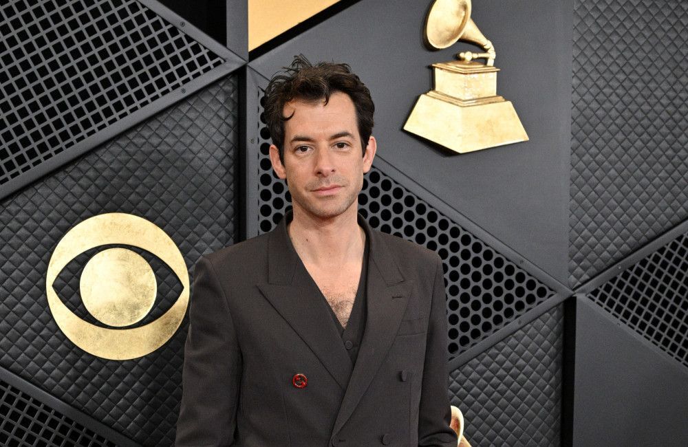 Mark Ronson has recalled the bizarre night he spent in Michael Jackson's hotel room when he was 13
