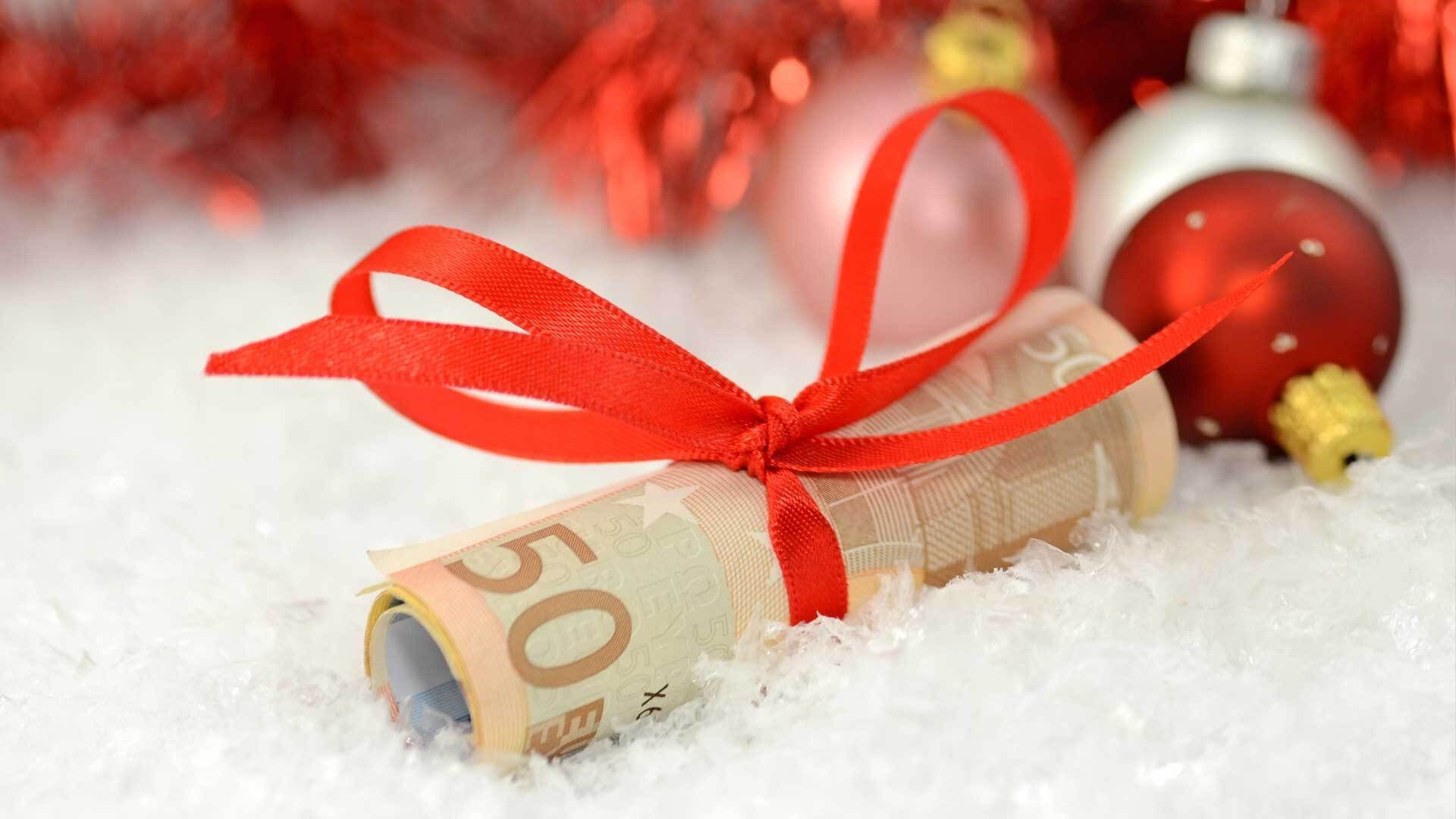 Geldgeschenke zu Weihnachten: Vor- und Nachteile für Kinder