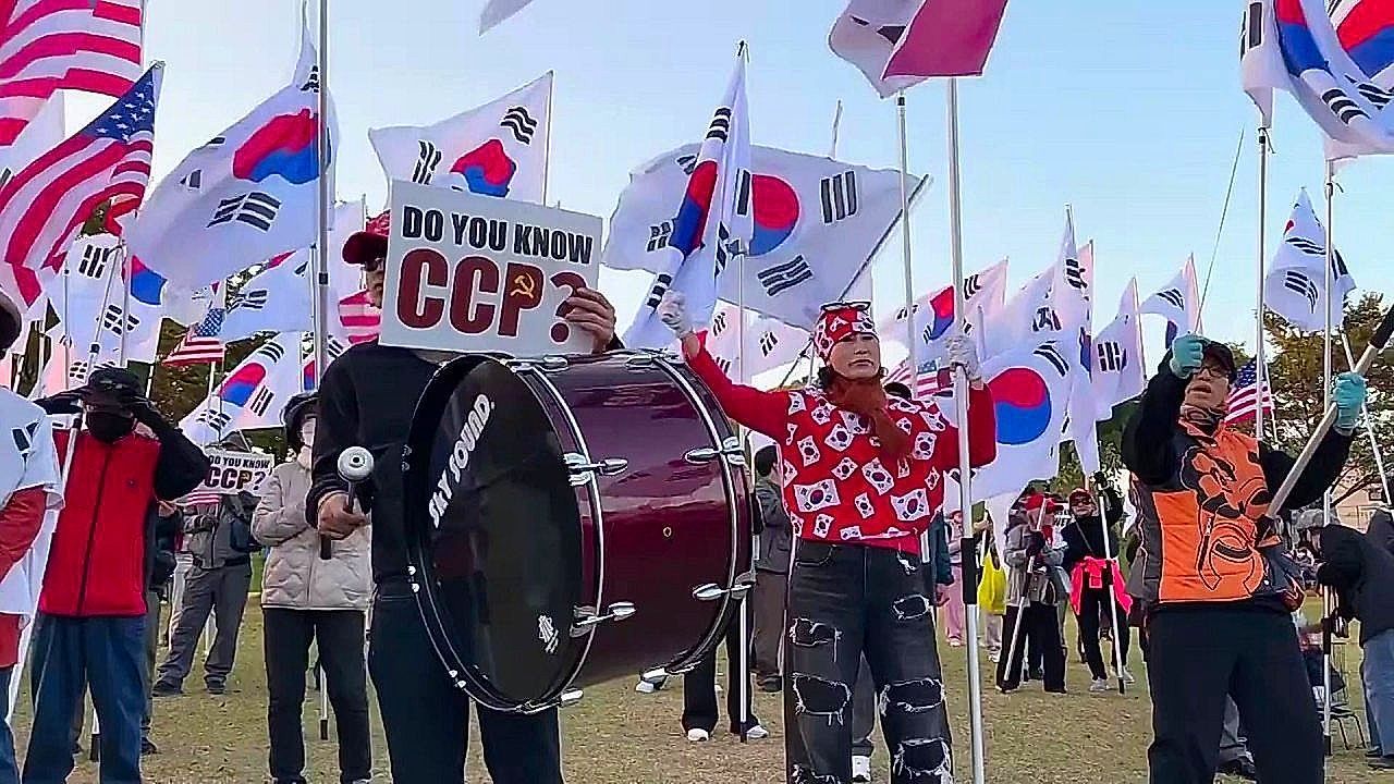Protesters rally against China ahead of Trump–Xi meeting in South Korea