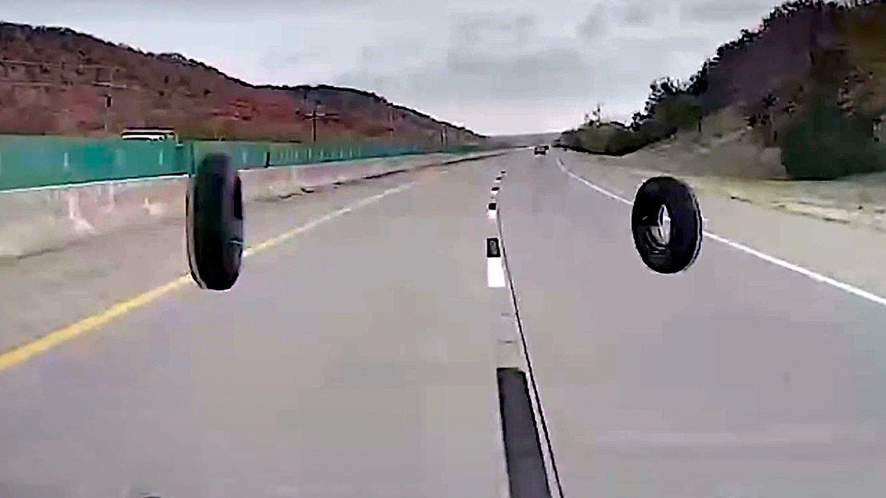 Flying-truck-tire-close-call-on-highway-leads-to-ICE-arrest