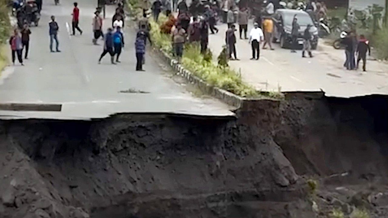Road-suddenly-collapses-in-shocking-scene-caught-on-camera