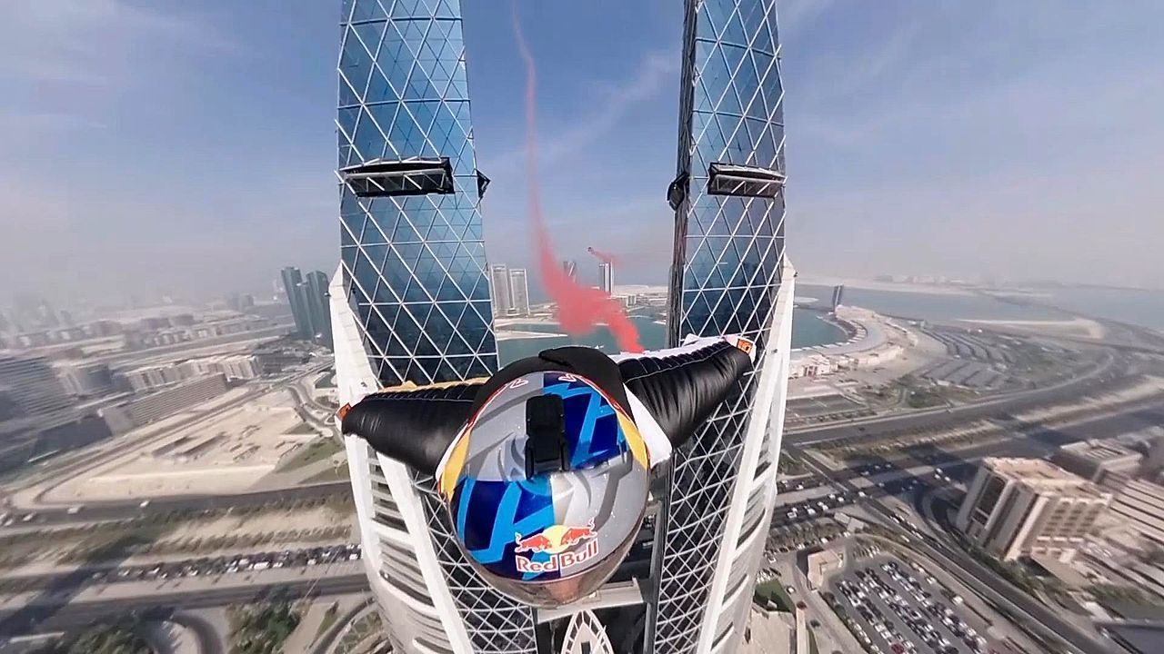 Video: History-makers - Dani Roman and Fred Fugen's world-first, synchronised wingsuit flight through the iconic Bahrain World Trade Center towers