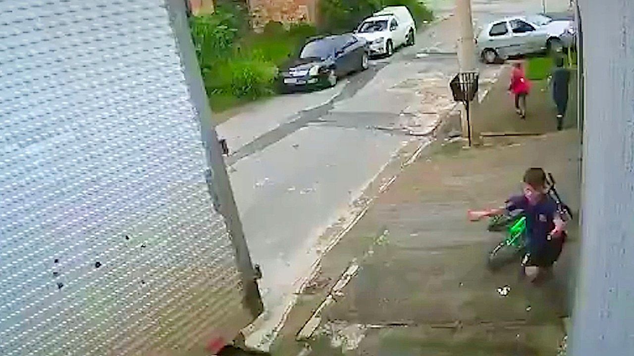 Video: Children narrowly escape disaster by inches in Brazil streets