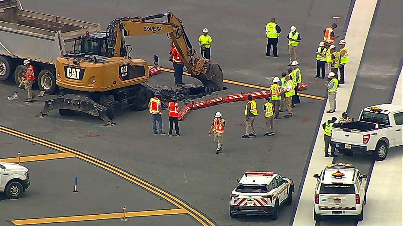 Video: New York City airport runway shut down after discovery of sinkhole