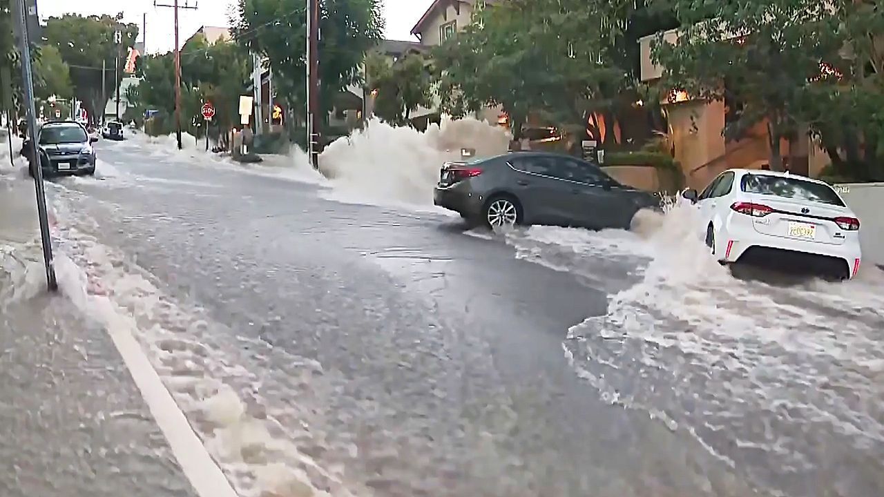 Video: Century-old water main bursts, flooding streets and opening sinkhole in West Hollywood
