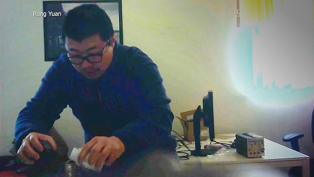 Video: Victim releases spy cam footage of co-worker poisoning her drink for months