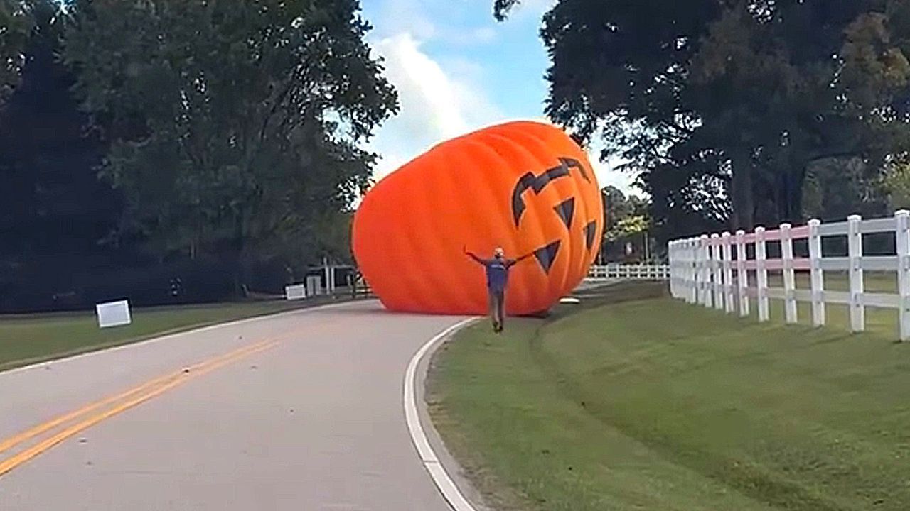 Giant inflatable pumpkin escapes from North Carolina festival and rolls down street